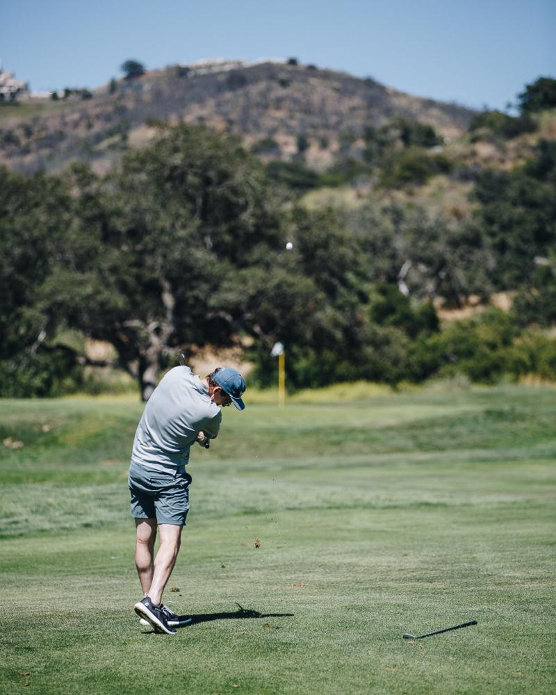 Derek golfing